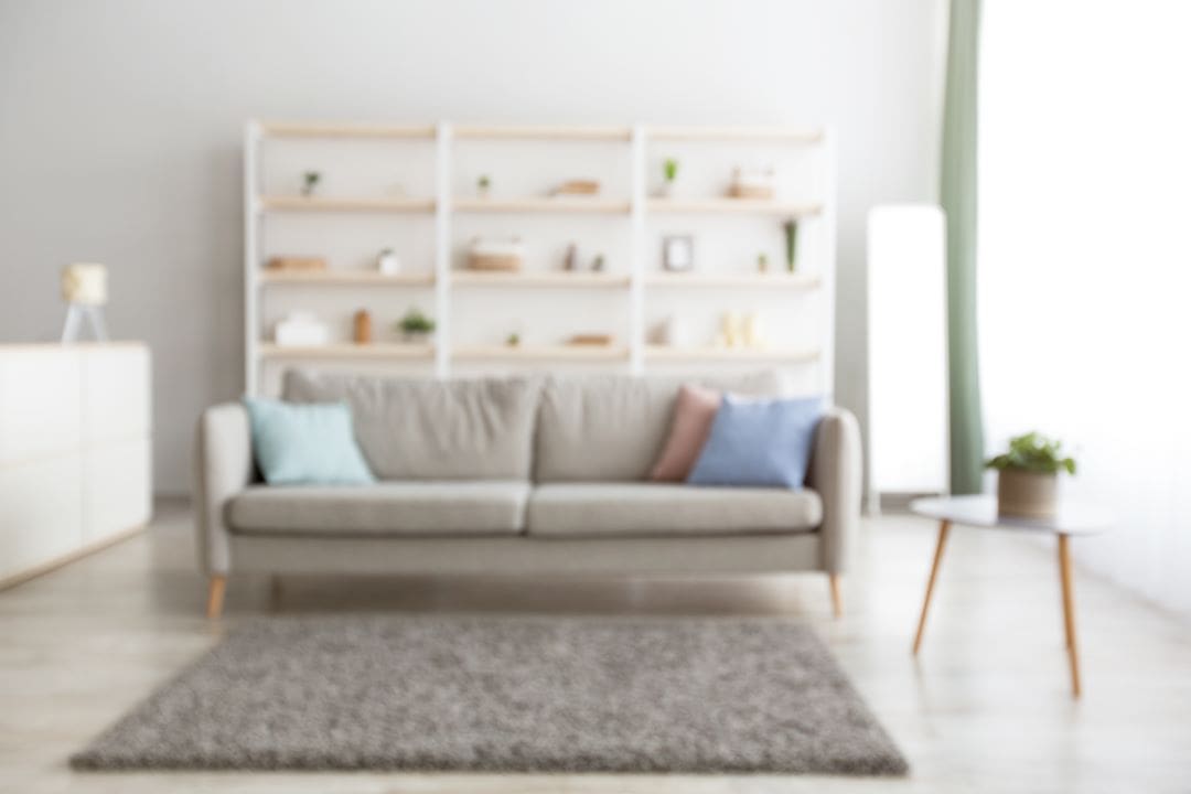 Joint Borrower Sole Proprietor Mortgages | Blurred image of a contemporary home